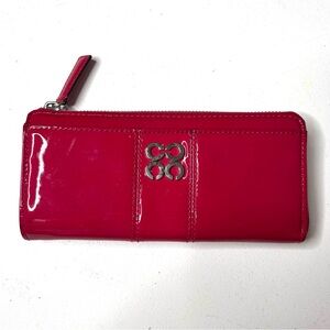Hot pink patent leather accordion zip wallet